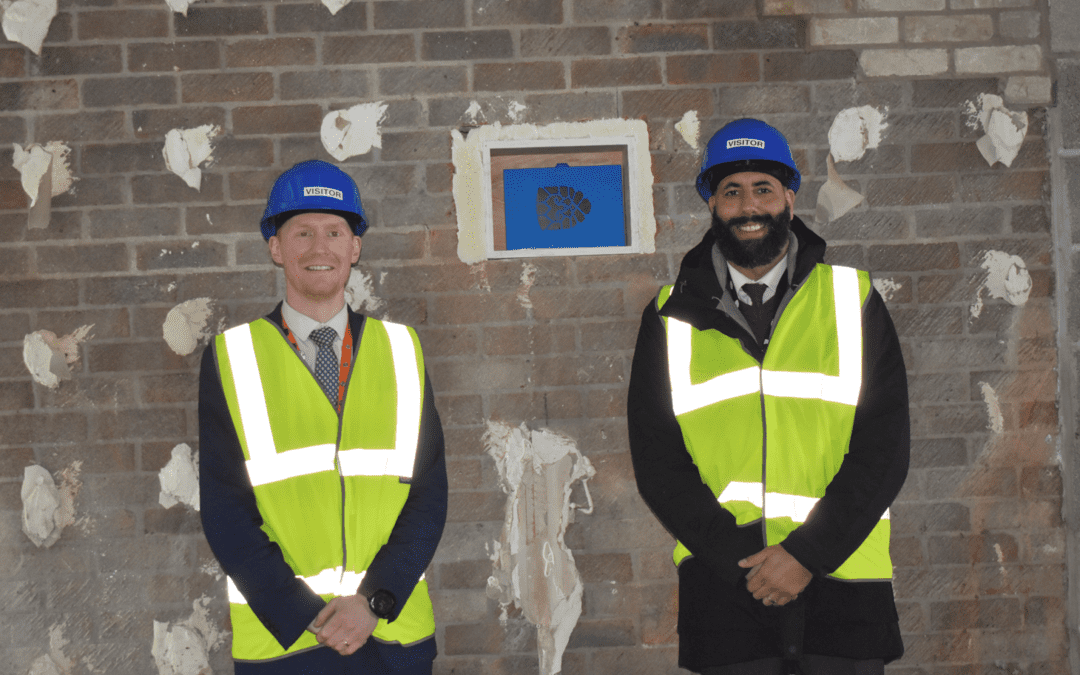 Hazel Grove Students bury time capsule in their new state-of-the-art sixth form building for future generations to discover
