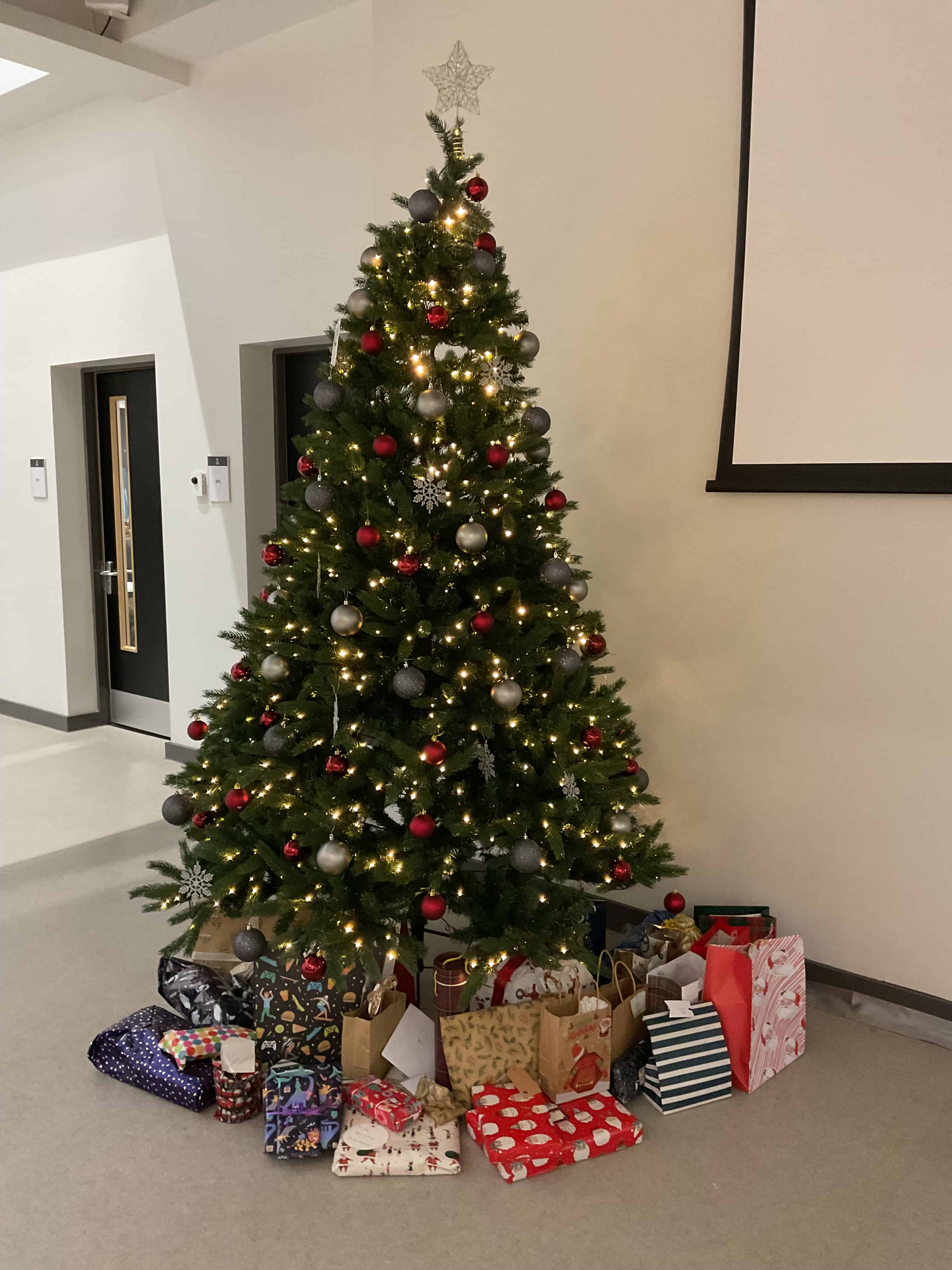 Gifts under the Christmas tree at Hazel Grove Sixth Form