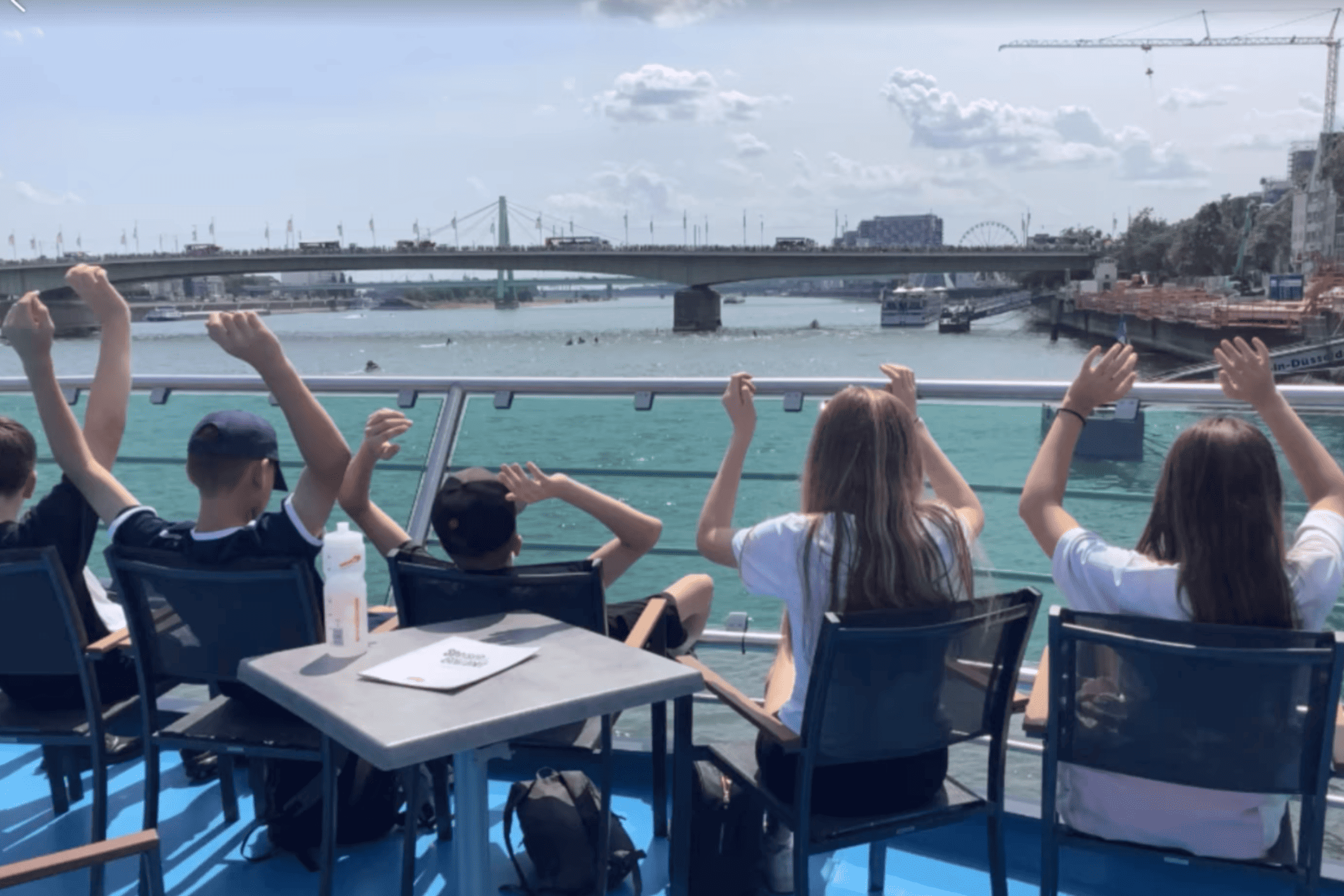 Hazel Grove High School students enjoying a boat trip on their trip in Cologne
